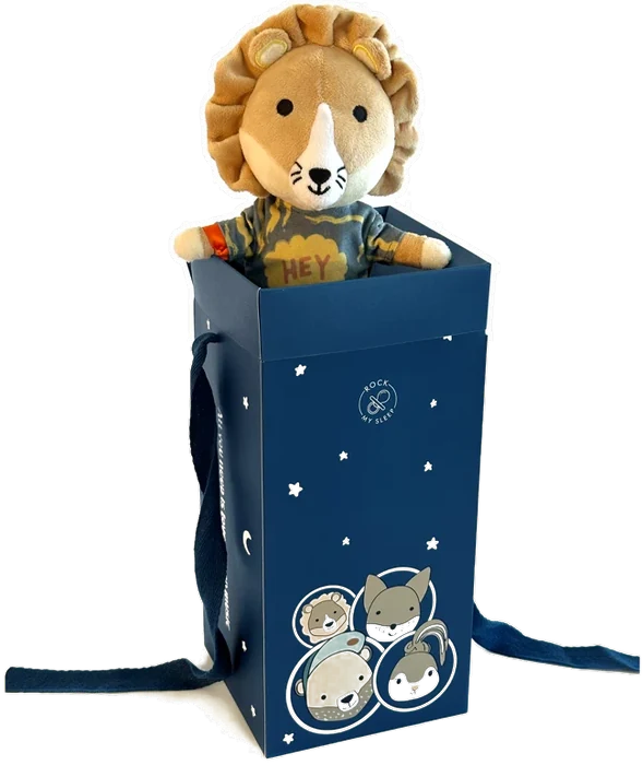 Eddie der Löwe schaut aus der Geschenkbox